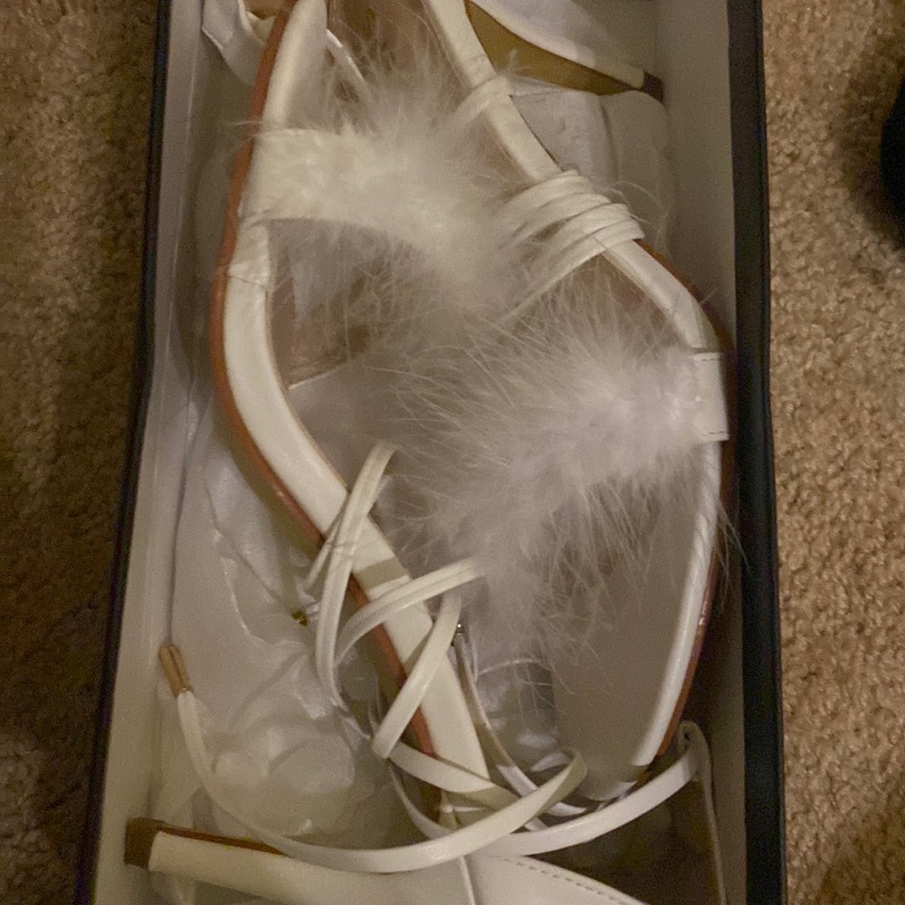 White strap up heels with fur